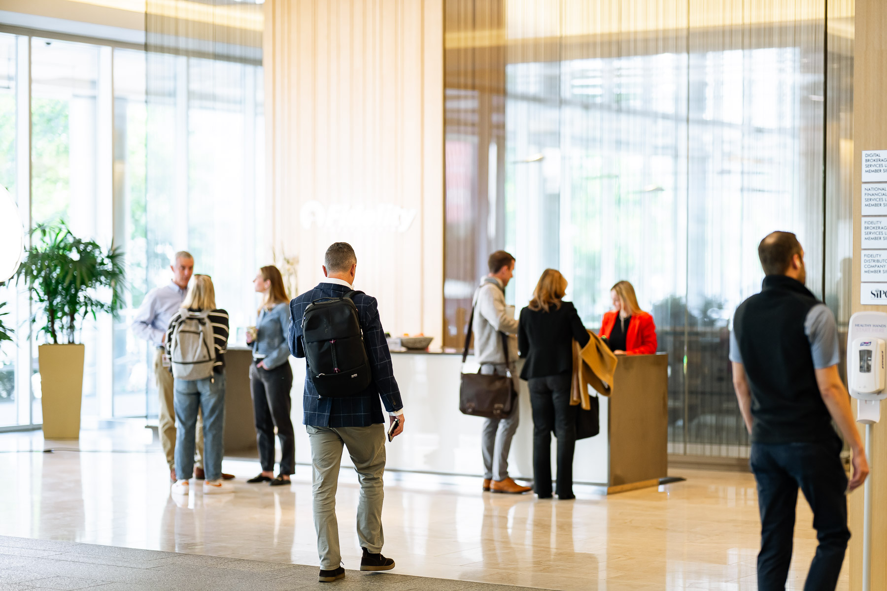 a group of people standing in front of a counter